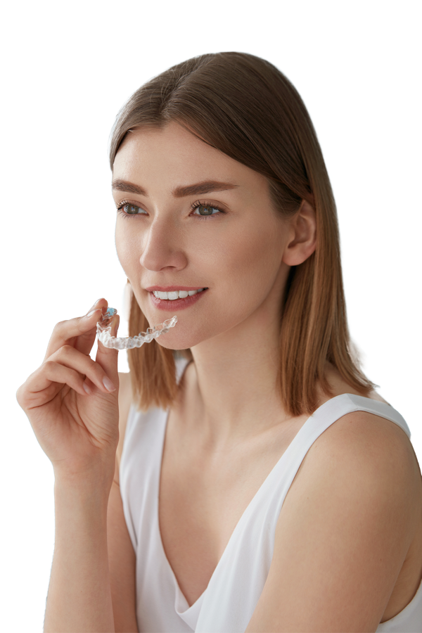 A dental patient holding a CINEQ clear aligner